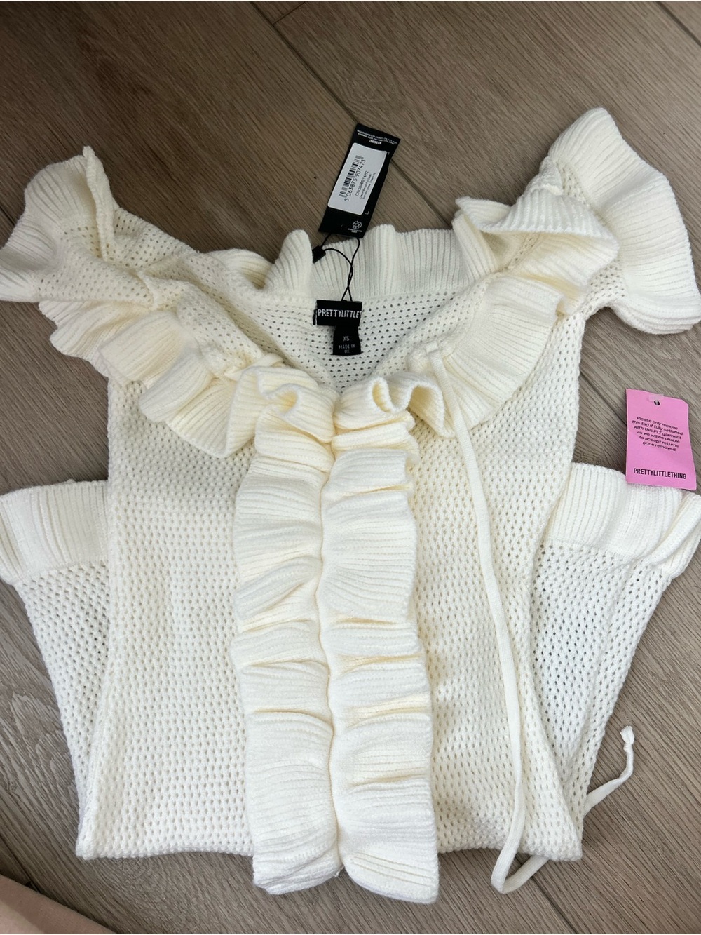 PrettyLittleThing Cream Off-Shoulder Ruffle Mini Dress - Picture 2 of 3